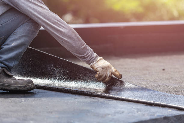 Professional Waterproofing technician working in Huntington Station, NY